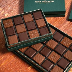 Box of dark and milk chocolates by Nina Métayer